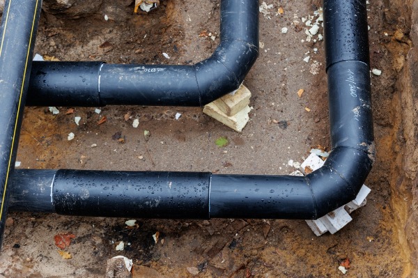 underground pipe replacement with new plastic pipe